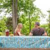 imageCamco Life is Better at The Campsite Tablecloth with Bench Covers  Provides a Clean Eating Surface for Outdoor Activities  Features an RV and Tree Sketch Design  53380