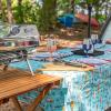 imageCamco Life is Better at The Campsite Tablecloth with Bench Covers  Provides a Clean Eating Surface for Outdoor Activities  Features an RV and Tree Sketch Design  53380
