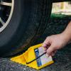 imageCamco Camper ampamp RV Wheel Chock with Rope  Keeps Trailer inPlace to Safely Unhitch or Park  Compatible with Wheels Up to 26 in Diameter ampamp Molded of HeavyDuty Hard Plastic  2Pack  44471w Rope Design