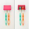 imageCamco PopAToothbrush Wall Mounted Toothbrush Holder  Guards Against Dust and Other Particles  Vented for Quick Drying  DoubleSided Tape for Permanent Mounting 57206Pink
