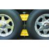 imageCamco Small RV Wheel Stop  Features a Lightweight HeavyDuty Design with a Rubber Handle Prevents Shifting of Trailer Tandem Tires While Parked or ReHitching and Fits 26 to 30 Tires 44652