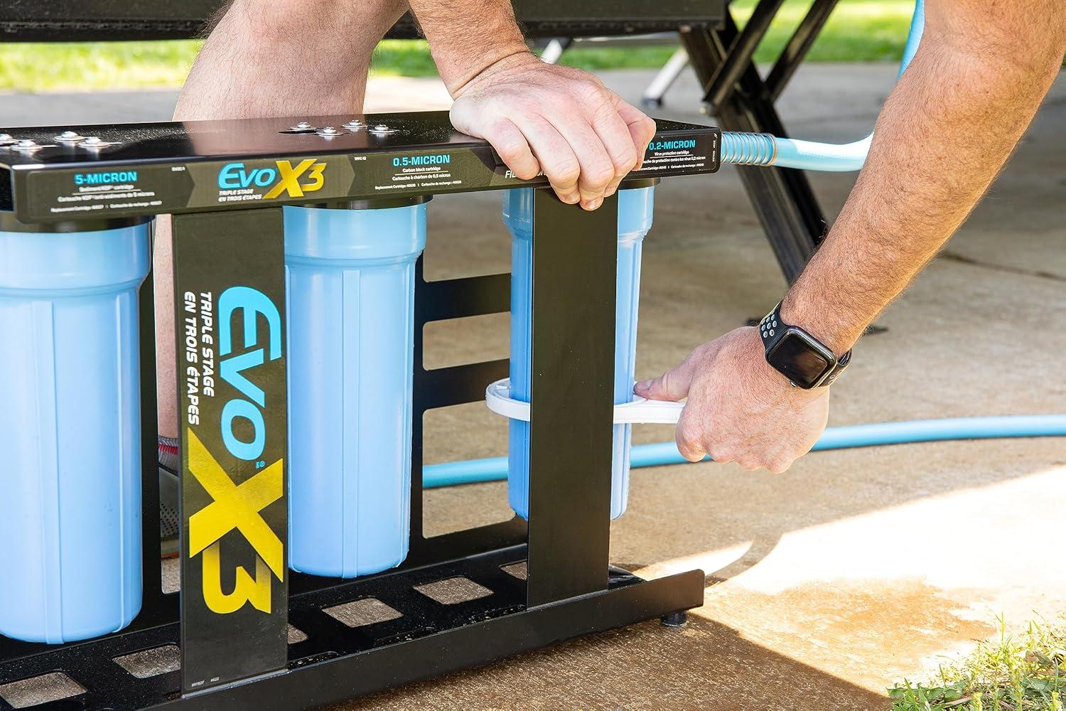 imageCamco Evo X3 Triple Stage Premium CamperRV Water Filter Kit  Features 3 Replaceable Cartridges to Remove Sediments Chlorine Bad Tastes Odors Viruses Bacteria Contaminates and More 40649