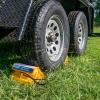imageCamco Standard Wheel Chock for Trailers ampamp RVs  Heavy Duty Trailer Wheel Chock Constructed of Durable Plastic wUV inhibitors  for Use wTires Up to 26inches  ReHitch in Confidence  44412Large w Rope